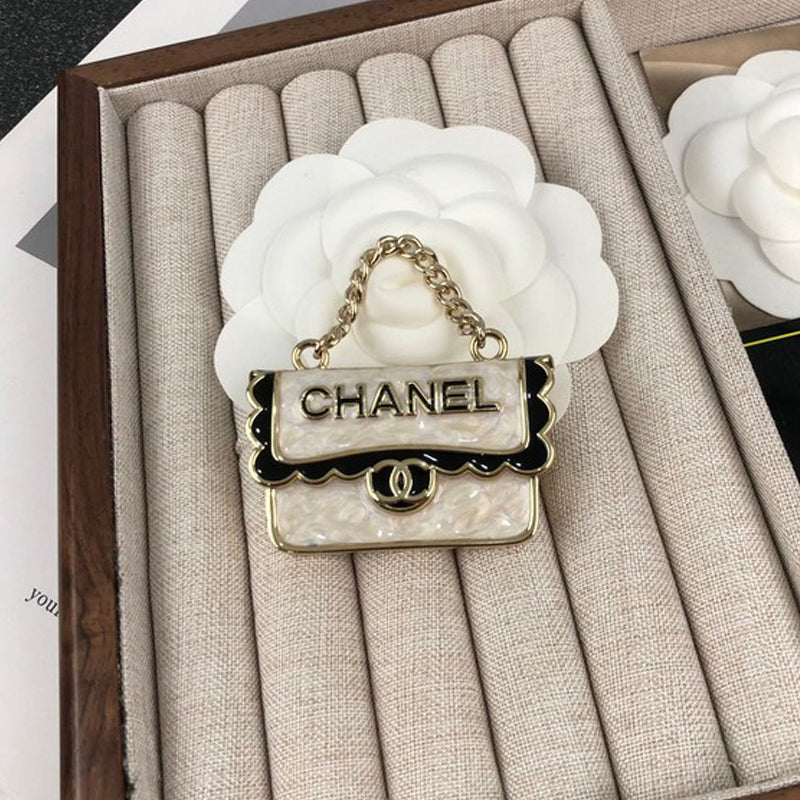 Chanel White Bag Brooch