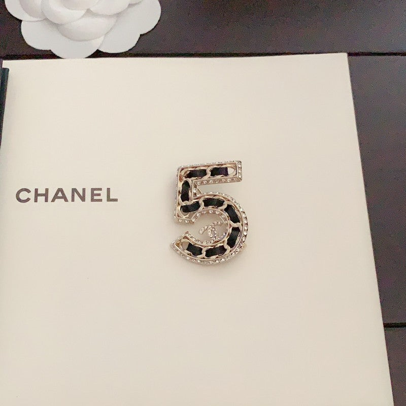 Chanel No.5 Leather Diamond Brooch