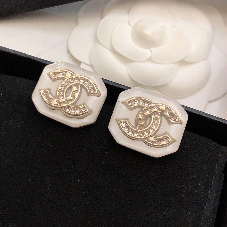 Chanel Resin Earrings - 18K Yellow Gold