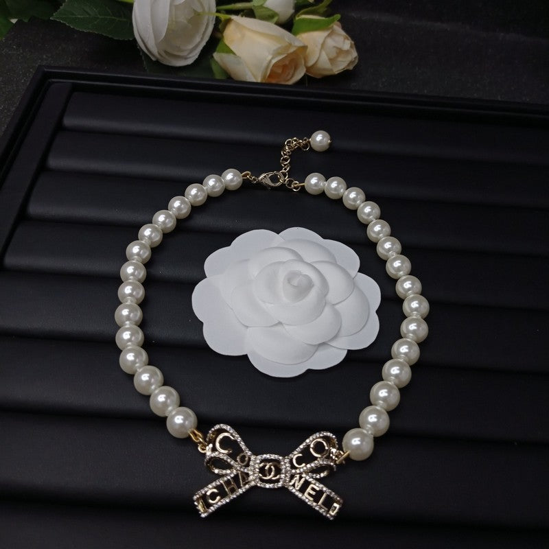 Chanel Bow Pearl Necklace