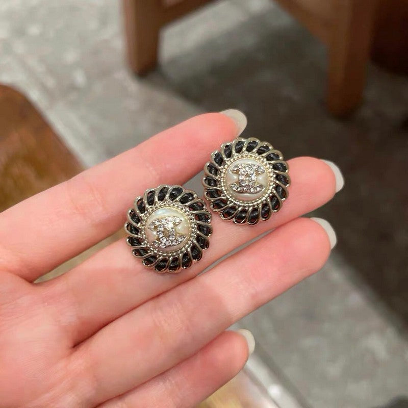 Chanel Black Earrings - 18K Yellow Gold