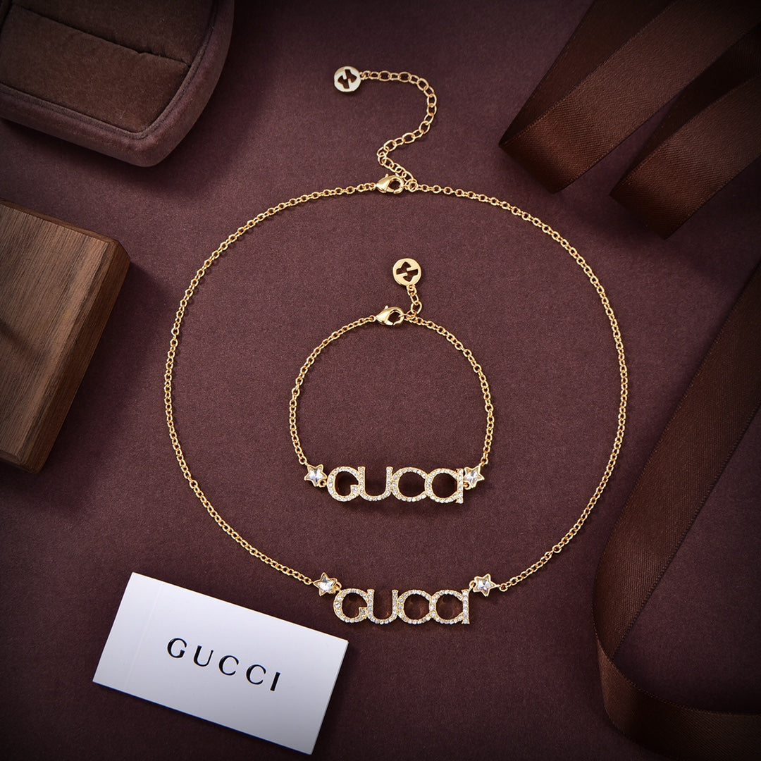 Gucci Double G Embellished Script Letter Earrings - 18K Yellow Gold