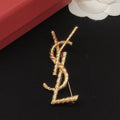 YSL Gold Brooch